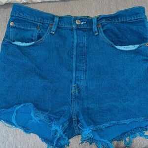 Levi's Women's Blue raw hem distressed Shorts size 32.  Excellent Condition